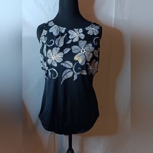 Delta Burke Women's 20W Black Swimsuit-Gold/White Floral Graphic Upper Front